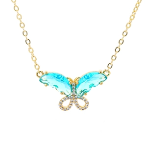 Elegant gold butterfly necklace featuring blue crystals and white zircon micro-pave setting