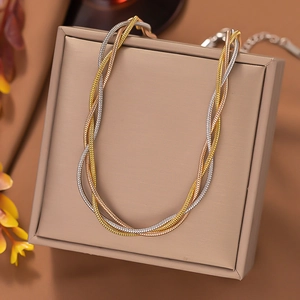 Three-tone braided snake chain necklace in gold, silver, and rose gold stainless steel