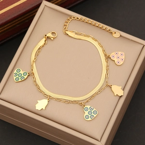 Bracciale a doppio strato in acciaio dorato con ciondoli a cuore malocchio e mano