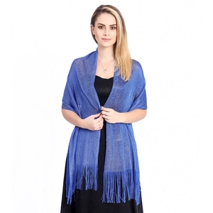 Detail of royal blue shawl with silver glitter threads and fringe trim for evening dresses