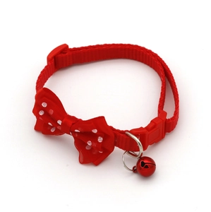 Adjustable red nylon pet collar with white polka dot bow and red metal bell for cats and dogs
