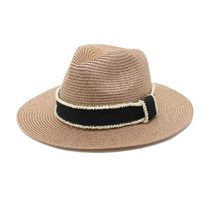 Khaki Panama straw fedora hat with black ribbon and bead trim, diagonal front view