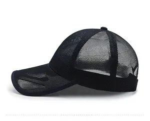 Side view of dark blue breathable mesh baseball cap with curved brim and adjustable strap