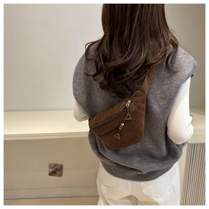 Brown corduroy waist bag on a model back view showing casual daily street style