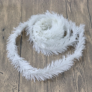 Detailed texture of white PVC artificial pine needle garland for Christmas home decoration