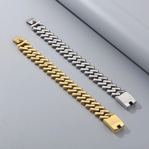 Close-up of 20mm Cuban chain bracelets in gold and silver polished titanium steel