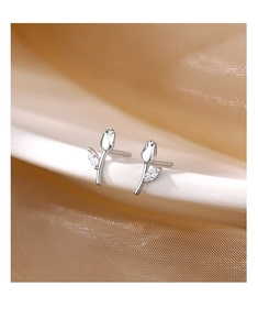 Detail shot of 925 sterling silver tulip stud earrings with sparkling cubic zirconia leaf