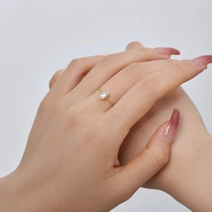 Close-up of adjustable chain ring with oval zircon and pavé crystals on hand