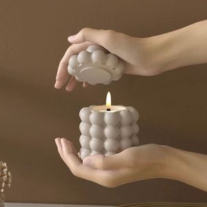 Pot à bougie sphère à bulles avec couvercle en plâtre mat de couleur gris chaud