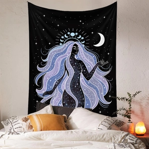 Bohemian tapestry featuring starry sky goddess in a cozy bedroom wall decor setting
