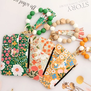 Floral PU leather card holders with silicone bead wristlets and tassels in green and beige