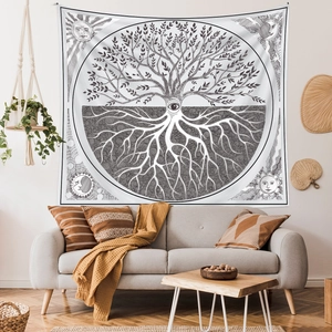 Detail of life tree tapestry with sun and moon motifs in a bohemian living room setting