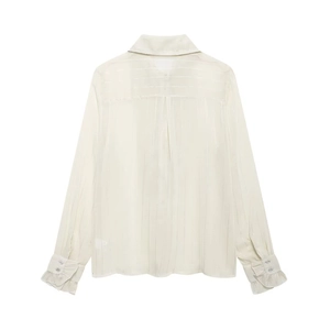 Back view of a white ruffled blouse with vertical stripes and delicate flared cuffs