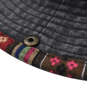 Foldable washed cotton bucket hat with ethnic woven band and metal ventilation eyelets