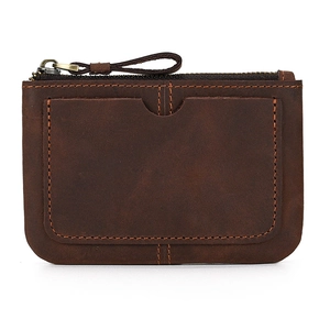 Macro view of vintage dark brown crazy horse leather coin purse with zipper and card slot