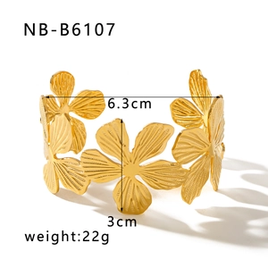 Detail view of 18K gold-plated flower bangle showing 6.3cm diameter and 3cm petal height