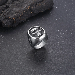Macro shot of punk skull ring in 316L stainless steel with gothic textured details