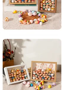 Detailed view of Crayon Shin-chan mini figures displayed in a rustic wooden shadow box frame
