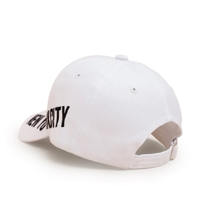 Detail of adjustable metal buckle and black CITY embroidery on white cotton baseball cap