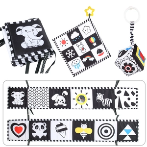 High-contrast black and white newborn cloth book set with hanging animal soft toys
