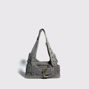 Vintage blue washed denim Y2K shoulder bag with large bronze buckle and metal rings