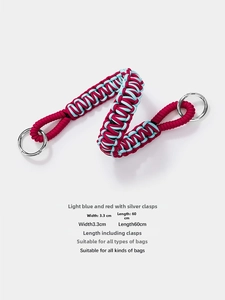 Detail of blue and pink woven purse strap with silver spring rings, 60cm length