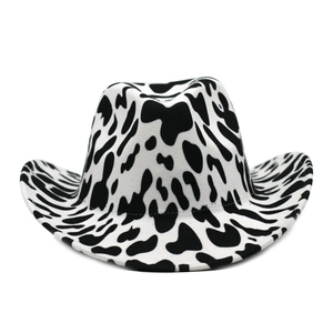 Classic cow print cowboy hat with curled brim and wide silhouette on white background