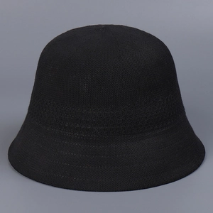Detail of breathable black knit bucket hat featuring fine weave texture and layered design