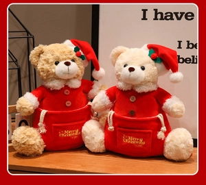 Detailed close-up of Christmas teddy bear plushies with Merry Christmas embroidery bags