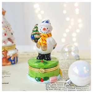 Ceramic snowman jewelry box with Christmas tree and festive red scarf details