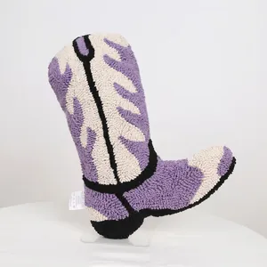 Tufted creative cowboy boot throw pillow with purple and cream geometric abstract patterns