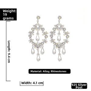 Detailed view of luxury rhinestone flower vine earrings with dimensions 9.4cm by 4.1cm