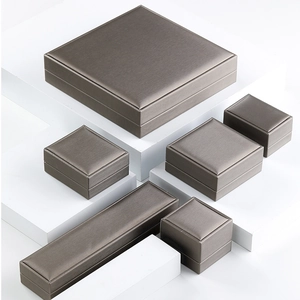 Brushed metallic grey jewelry box collection for rings and necklaces in various sizes