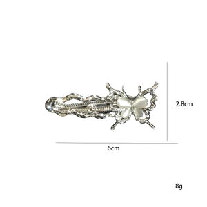 Detail of alloy butterfly hair clip with cat eye stone, size 6cm by 2.8cm and 8g weight