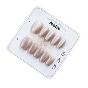 Handmade champagne cat-eye press-on nails set with elegant floral display card