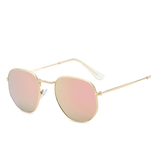 Retro polygon sunglasses with gold metal frame and pink tinted lenses for men and women