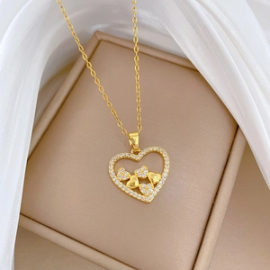 Close-up of heart pendant necklace with shimmering zircon stones in a jewelry box