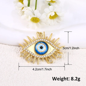 Detailed view of evil eye pendant with blue enamel and crystal inlay dimensions