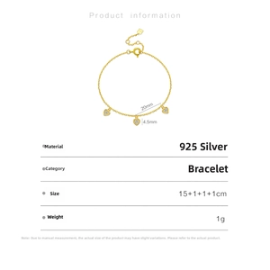 Detailed view of S925 silver bracelet featuring three dainty heart charms with tiny diamonds