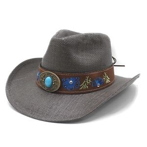 Gray straw cowboy hat with turquoise stone and floral embroidery on a brown band