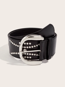 Detail of wide black PU leather belt featuring a large D-ring buckle and silver metal studs