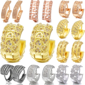 Assorted gold and silver plated copper huggie hoop earrings with cubic zirconia stones