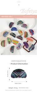 Detail view of large acrylic hair claw with polka dots and bohemian patterns