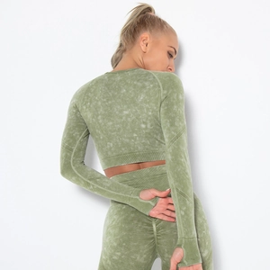 Detail of retro green seamless gym set showing thumb holes and washed fabric texture