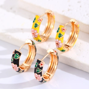 Retro Chinese style enamel flower hoop earrings in yellow and black with gold finish