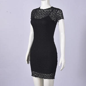 Close-up of black lace texture on a bodycon mini dress with intricate floral embroidery