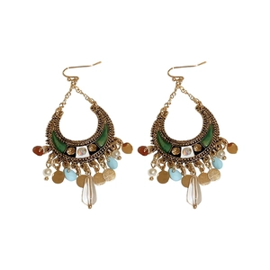 Bohemian gold crescent moon earrings with green enamel and colorful beaded tassels