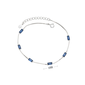 Detailed view of S925 sterling silver bracelet with 6mm baguette-cut blue stones
