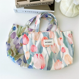 Cute tulip canvas tote bag with floral patterns for women, stylish lifestyle accessories