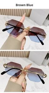 Detail of rimless gradient brown blue sunglasses with gold metal temples and cut edges